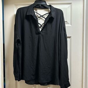NWT. Black crisscross back blouse